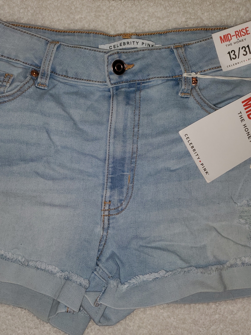 Celebrity Pink Light Wash Frayed Mid-Rise Denim Shorts